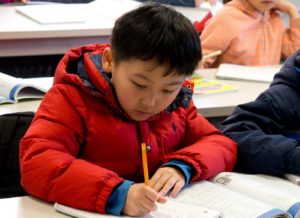 Elementary school student learning Singapore Math