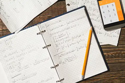 A notebook with math equations